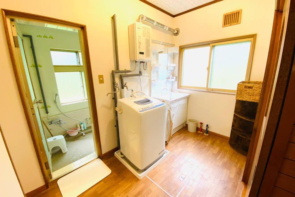 Вілла Manyi'S Onsen House 天然温泉マンイの湯 Shiraoi Екстер'єр фото